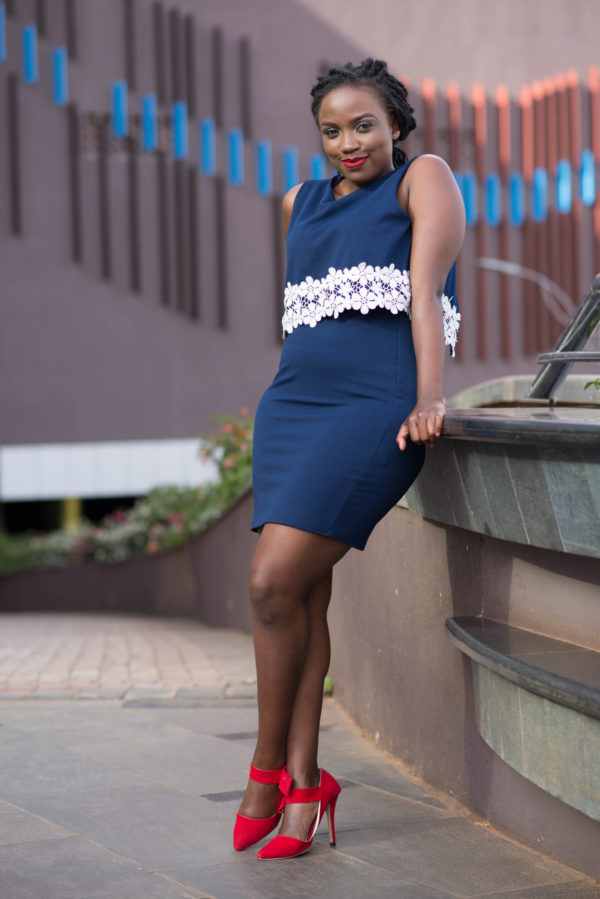 Sleeveless navy dress with lace detail and mesh back